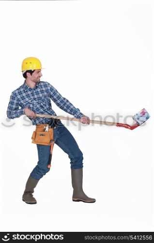 Builder lifting a house