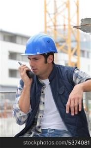 Builder on walkie talkie