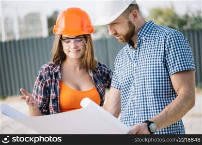 builder showing blueprint colleague