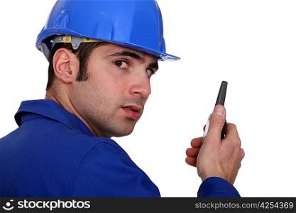 Builder using a walky talky