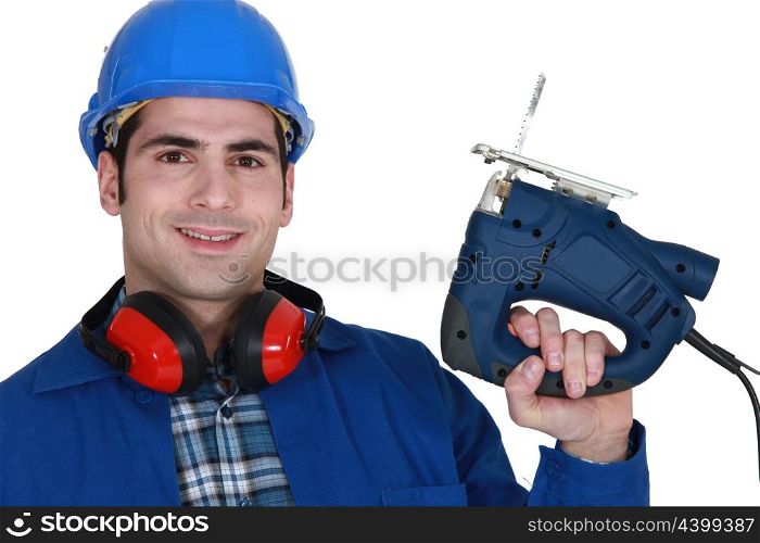 Builder with a jigsaw