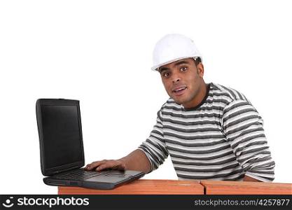 Builder with a laptop