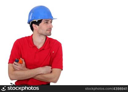 Builder with a tape measure