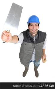 Builder with a trowel