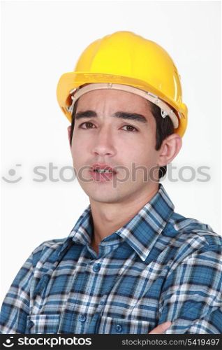Builder with confused face