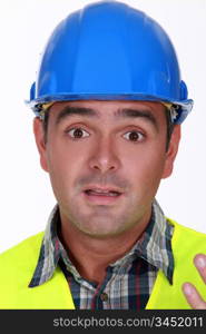 Builder with confused look on his face