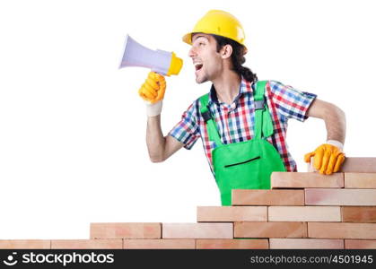 Builder with hard hat on white