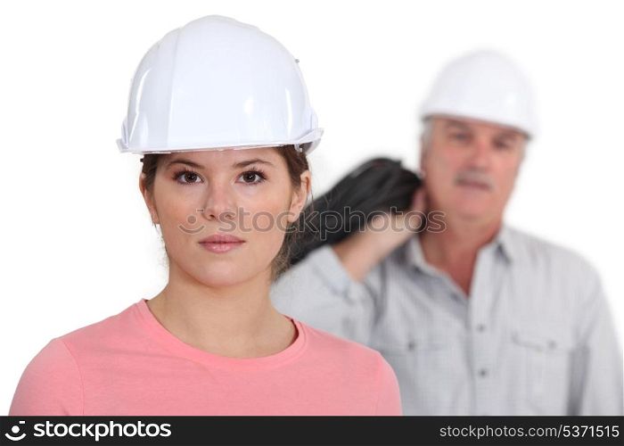 Builder with young female student