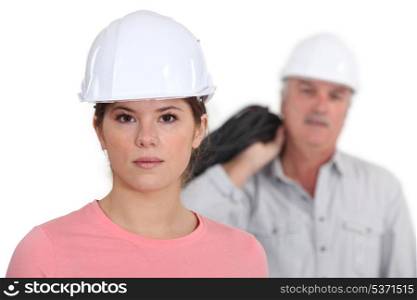 Builder with young female student