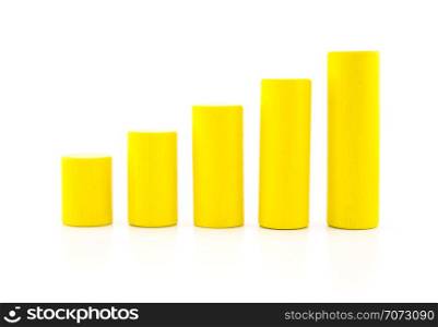 building a growing financial graph using yellow color wood toy isolated on white background, finance successful business concept.