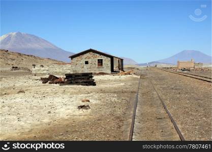Building and railway near Uyuni in Bolivia