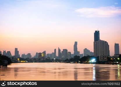 Building and skyscraper Bangkok city in morning. blue sky and cloud in summer.