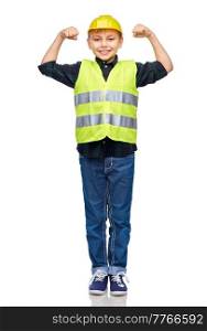 building, construction and profession concept - happy smiling little boy in protective helmet and safety vest showing power gesture over white background. boy in protective helmet showing power gesture