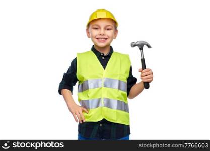 building, construction and profession concept - happy smiling little boy in protective helmet and safety vest with hammer over white background. boy in protective helmet and vest with hammer