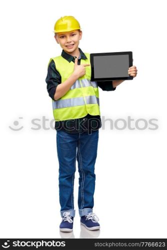 building, construction and profession concept - happy smiling little boy in protective helmet and safety vest with tablet pc computer over white background. boy in construction helmet with tablet computer