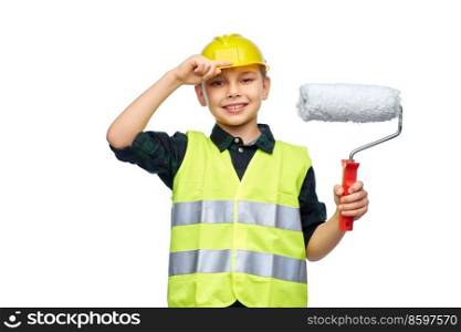 building, construction and profession concept - happy smiling little boy in protective helmet and safety vest with paint roller over white background. little boy in protective helmet with paint roller