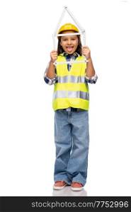 building, construction and profession concept - smiling little girl in protective helmet and safety vest with ruler in shape of house over white background. little girl in helmet with ruler in shape of house