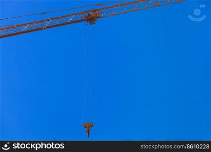 building crane on a background of blue sky