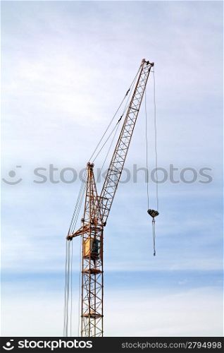 building crane on cloudy background