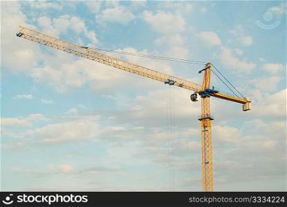 Building crane with blue sky background