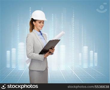 building, developing, consrtuction and architecture concept - friendly young smiling architect in white helmet with blueprint and clipboard