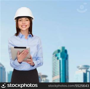 building, developing, consrtuction and architecture concept - friendly young smiling businesswoman in white helmet