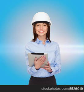 building, developing, consrtuction and architecture concept - friendly young smiling businesswoman in white helmet