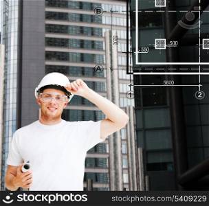 building, developing, consrtuction and architecture concept - male architect in helmet with blueprint and safety glasses