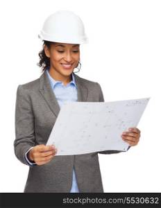 building, developing, consrtuction and architecture concept - smiling businesswoman in white helmet looking at blueprint