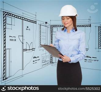 building, developing, consrtuction and architecture concept - smiling businesswoman in white helmet with clipboard