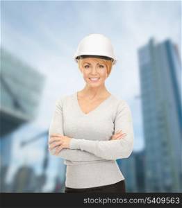 building, developing, consrtuction, architecture concept - female contractor in white helmet