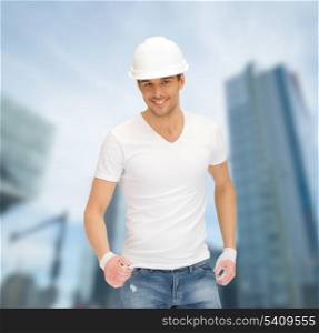 building, developing, consrtuction, architecture concept - handsome builder in white helmet