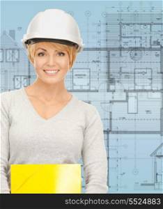 building, developing, construction and architecture concept - female contractor in helmet