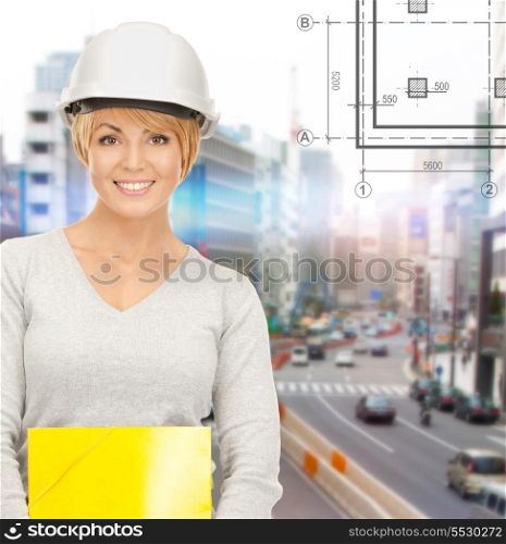 building, developing, construction and architecture concept - female contractor in helmet with folder