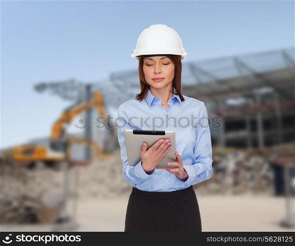 building, developing, construction and architecture concept - smiling businesswoman in white helmet ant tablet pc computer