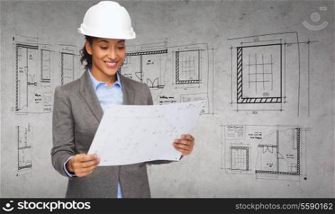 building, developing, construction and architecture concept - smiling businesswoman in white helmet looking at blueprint