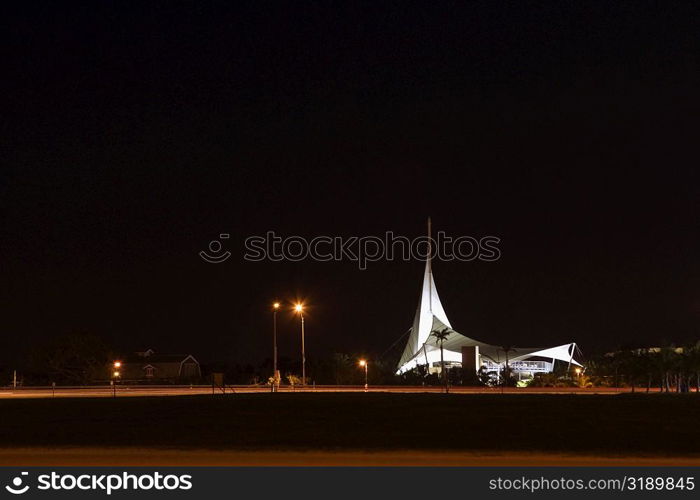 Building lit up at night, Miami, Florida, USA