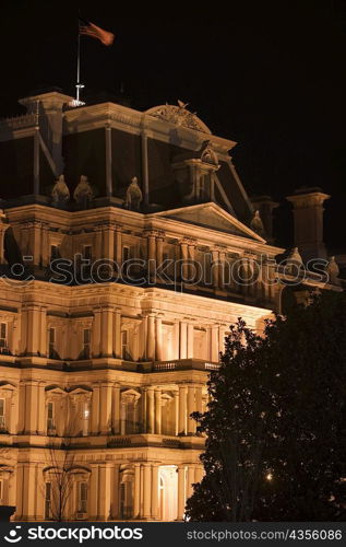 Building lit up at night, Washington DC, USA