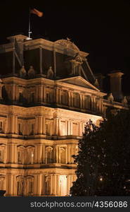 Building lit up at night, Washington DC, USA