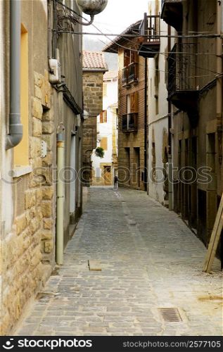 Building on both sides of an alleyway, Spain