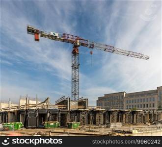Building site with cranes and scaffolding