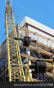 Building - the crane near the under construction house. Taken from the bottom up