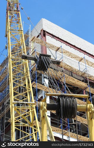 Building - the crane near the under construction house. Taken from the bottom up