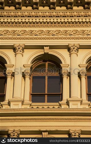 Building with windows and carved panels
