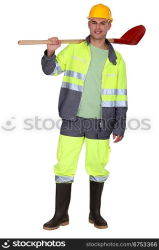 Building worker in work outfit