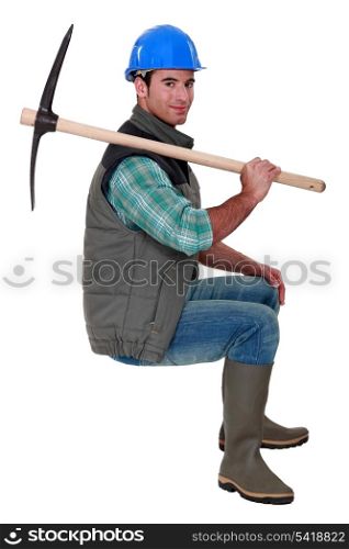 Building worker with pickaxe