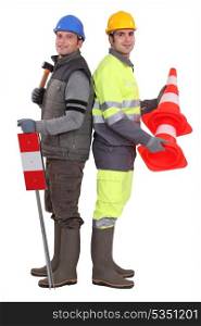 Building workers standing on white background