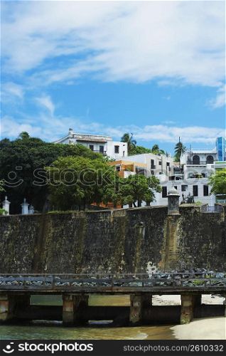 Buildings along a castle, Morro Castle, Old San Juan, San Juan, Puerto Rico