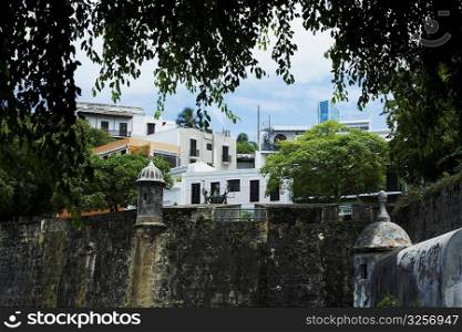 Buildings along a castle, Morro Castle, Old San Juan, San Juan, Puerto Rico