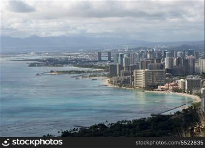 Buildings along beachfront viewed from Diamond Head, Waikiki, Kapahulu, Honolulu, Oahu, Hawaii, USA